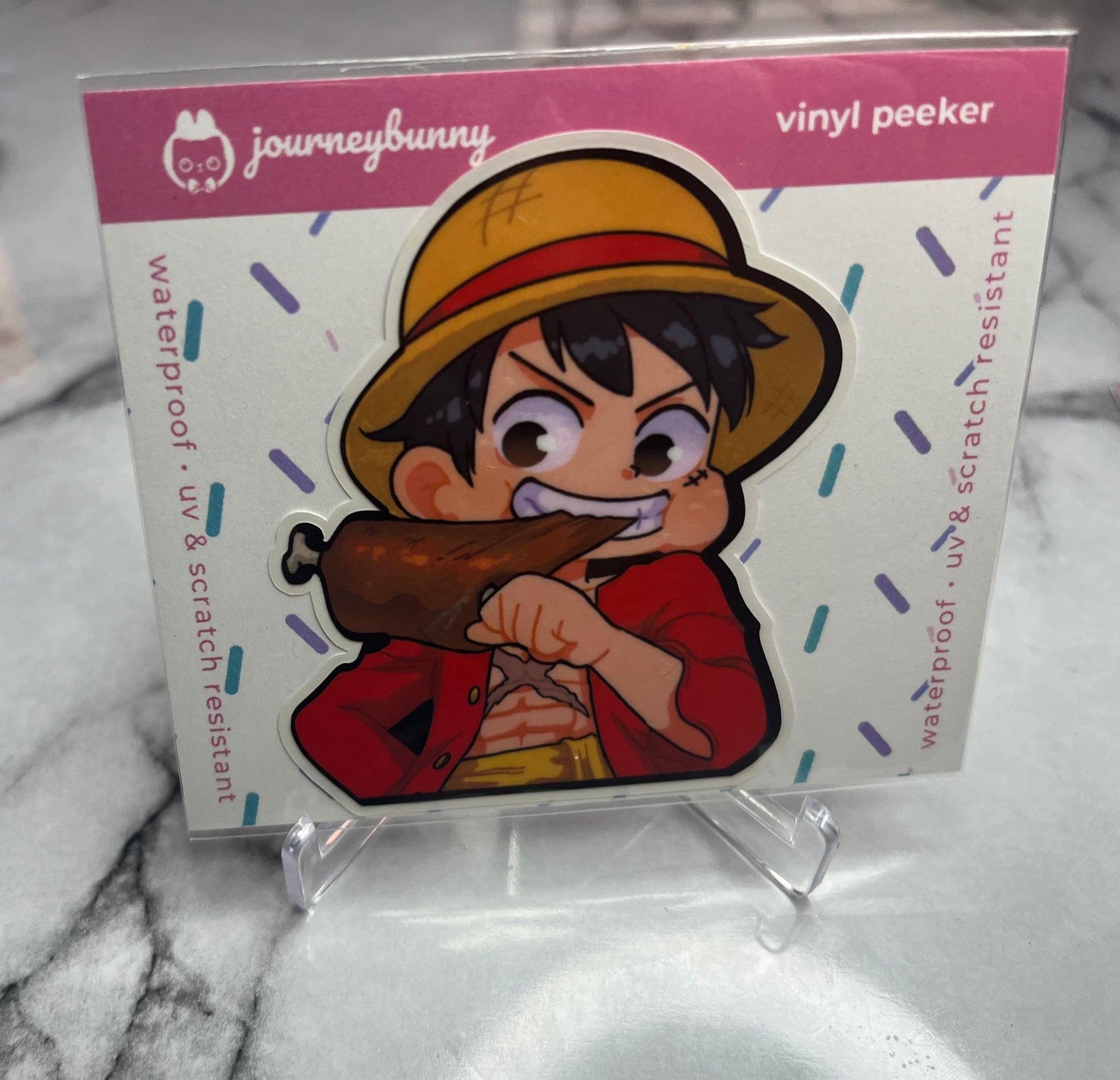 Sticker of luffy eating a piece of meat 